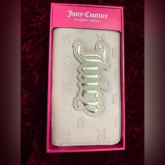 Juicy Couture Handbags - Juicy Couture Cream Embossed Phone Case